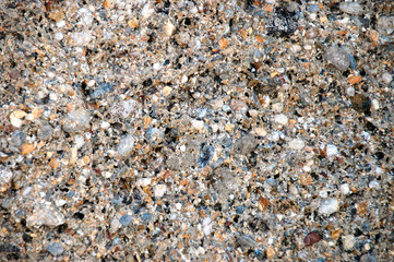 Abstract background with brown pebbles. Round sea multicolored stones