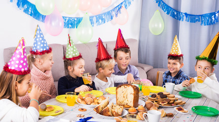 Children having birthday dinner