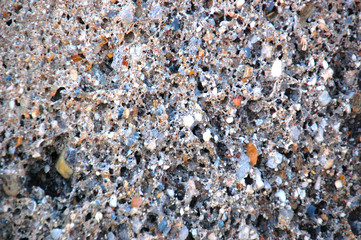 Volcanic rock, a lot of multi-colored stones - texture