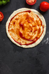 pizza - dough, preparation, flat cake (the process of cooking). Top view with copy space