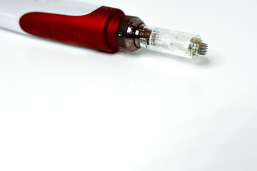 Dermis stamp electric pen. Dermapen. Needle mesotherapy treatment. 