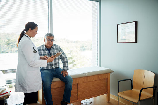 Doctor talking to man