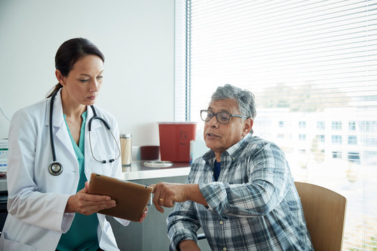 Doctor talking to man