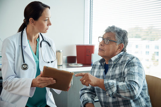 Doctor talking to man