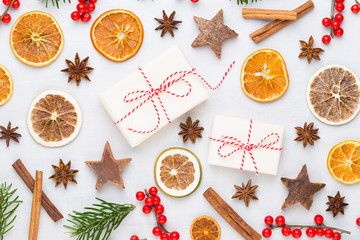 Christmas greeting card. Christmas tree branch on glitter golden bokeh lights background. New Year concept. Copy space.