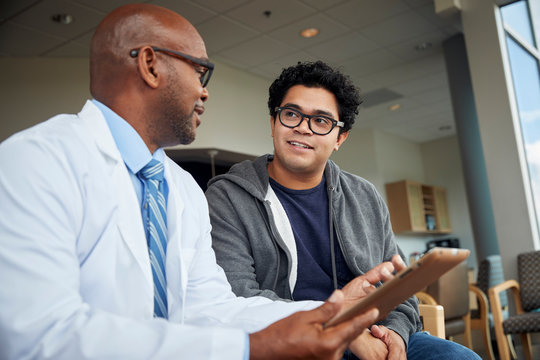 Doctor talking to boy