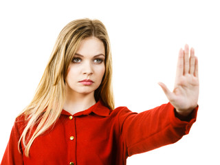 Woman showing stop gesture