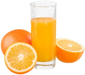 Fresh oranges and glass of juice