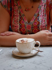 Cappuccino with marilyn monroe chocolate dusting on top