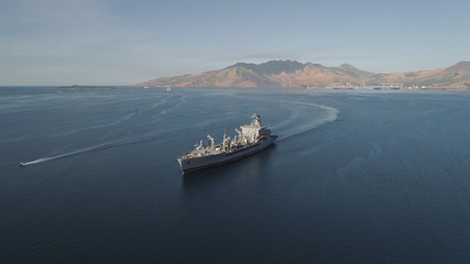 Aerial view: Cargo, Reefer ship in the sea bay. Subic Bay, Philippines, Luzon. Cargo ship in the...