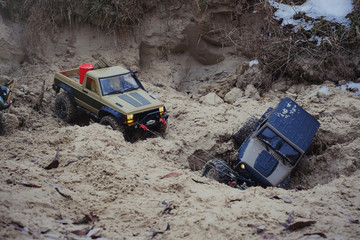 radio-controlled car and road situation illustration help, car pulls with a cable helps to go, rc car