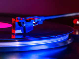 Cinemagraph, retro record vinyl player. Record on turntable. Top view close up. Loop-able Vintage...