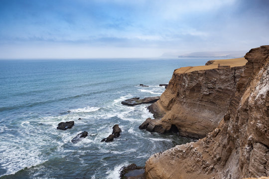 The Stunning And Impressive Cliffs Of Paracas National Reserve Where The Desert Meets The Ocean. 