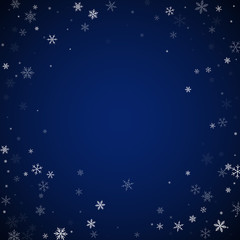 Sparse snowfall Christmas background. Subtle flyin