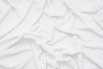 white crumpled blanket, plaid, top view