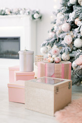 New Year's interior with a fir tree in white and pink tones