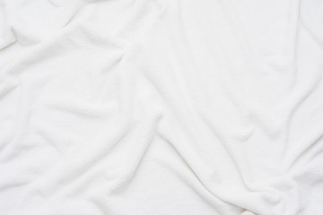 white crumpled blanket, plaid, top view