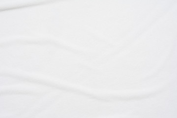 Obraz premium biały pomięty koc, widok z góry