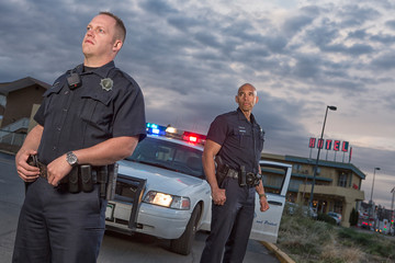EMERGENCY SERVICES - Gang Unit Police Partners patrol the streets