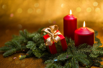 Obraz na płótnie Canvas christmas new year, presents, spruce branch, candles