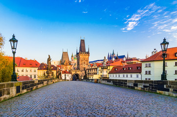 Naklejka na ściany i meble Prague, Czech republic: Charles bridge with its statuette, Lesser Town Bridge Tower and the tower of the Judith Bridge in The Mala Strana