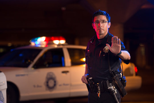  Policeman gesturing to stop