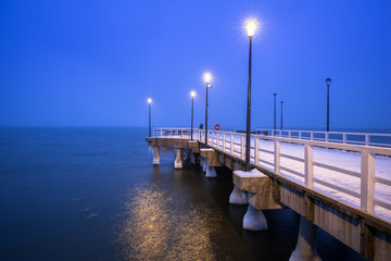 Naklejka premium Snowy pier at Baltic Sea in Gdansk, Poland
