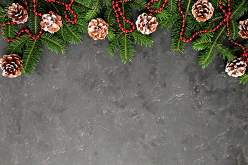 Fototapeta na wymiar Christmas background with fir tree decor, Top view. Copy space.