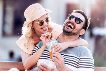 Lovely  couple sitting on the bench