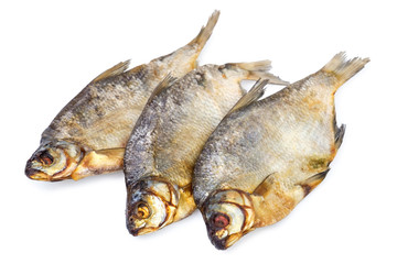 three dried salted fishes isolated on white background.