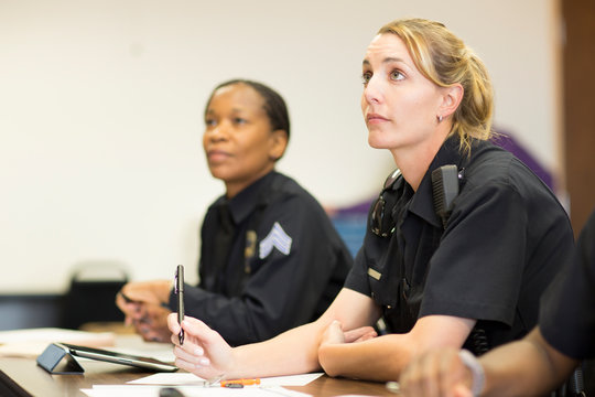 Policewomen in classroom