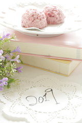 Hand written 2019 lace paper and chocolate for new year background