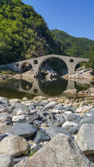 Fototapeta na wymiar Landscape of medieval Devil's Bridge, Arda river and Rhodopes mountain, Kardzhali Region, Bulgaria