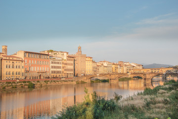 Beautiful view of the Ponte Vecchio bridge across the Arno River in Florence, Italy