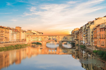 Beautiful view of the Ponte Vecchio bridge across the Arno River in Florence, Italy