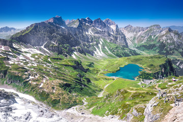 View of Truebsee and Swiss Alps from Titlis mountain. - obrazy, fototapety, plakaty