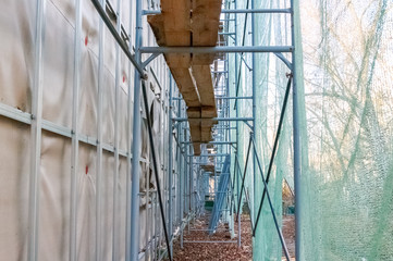 Construction site restoration work on the renovation of the old facade of the building