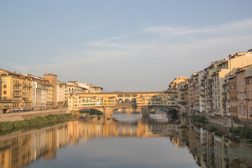 Fototapeta na wymiar Beautiful view of the Ponte Vecchio bridge across the Arno River in Florence, Italy