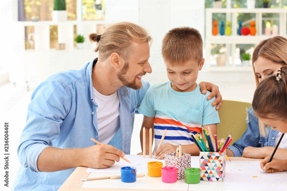 Canvas Prints cute children drawing with parents at home