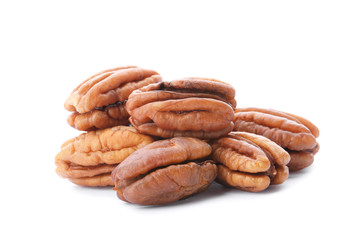 Heap of ripe shelled pecan nuts on white background