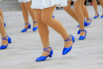White dress and blue shoes