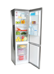 Open refrigerator with many different products on white background