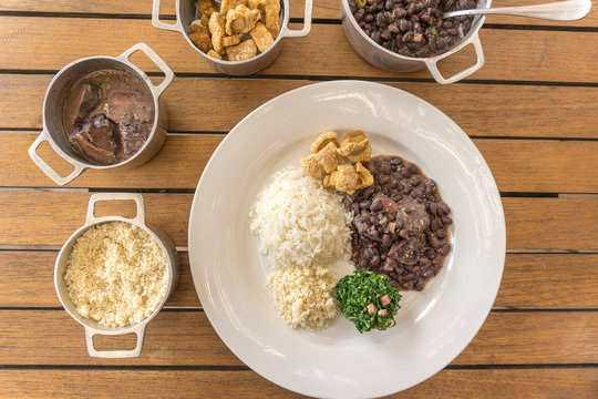 White dish with ingredients of feijoada, typical food of Brazil
