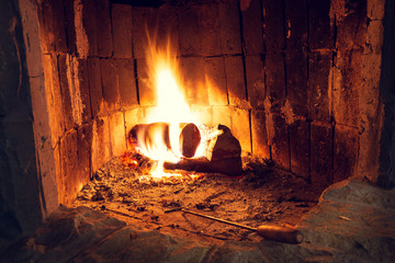 Fire in an old home fireplace.