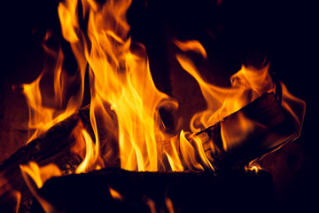 Fire in an old home fireplace.