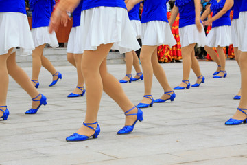 White dress and blue shoes