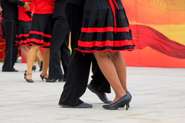 red stripe dress and black shoes