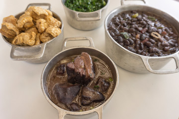 Ingredients of feijoada, typical food of Brazil