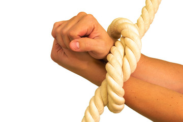 Men's hands are tied in ropes and clenched in their fists.