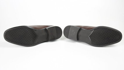 Classic men's brown shoes sole on white background